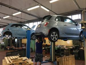 working on Fiat 500e in Italy